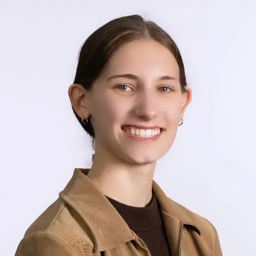 A headshot-style photograph of Christine Kapp