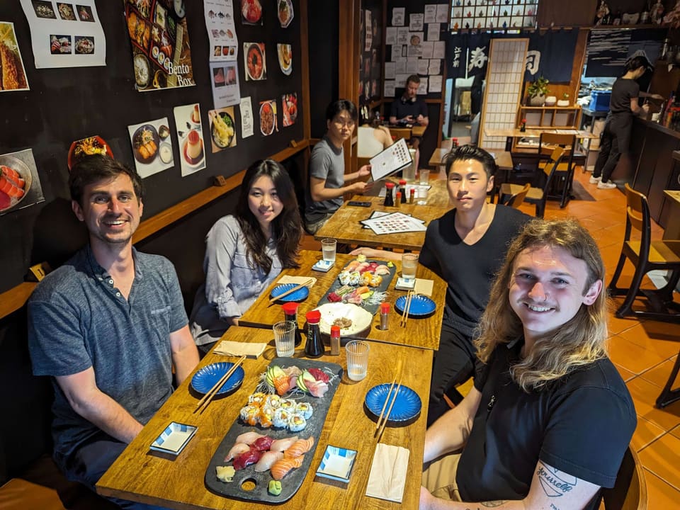 Dr. Stephen MacNeil, Owen Man, and Irene Hou enjoy dinner after presenting at ACE 2024
