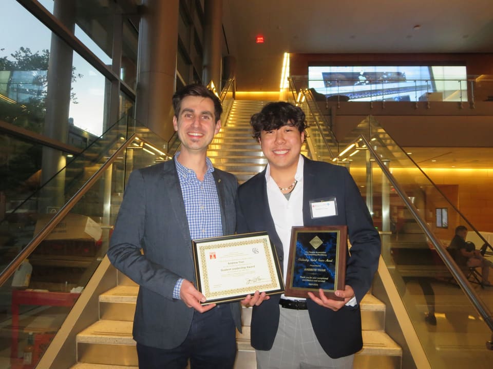 Dr. Stephen MacNeil and Andrew Tran pose together at ACM Awards Ceremony