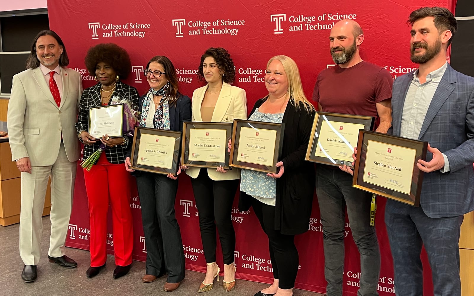 Stephen MacNeil standing with fellow College of Science and Technology award honorees at Temple University.