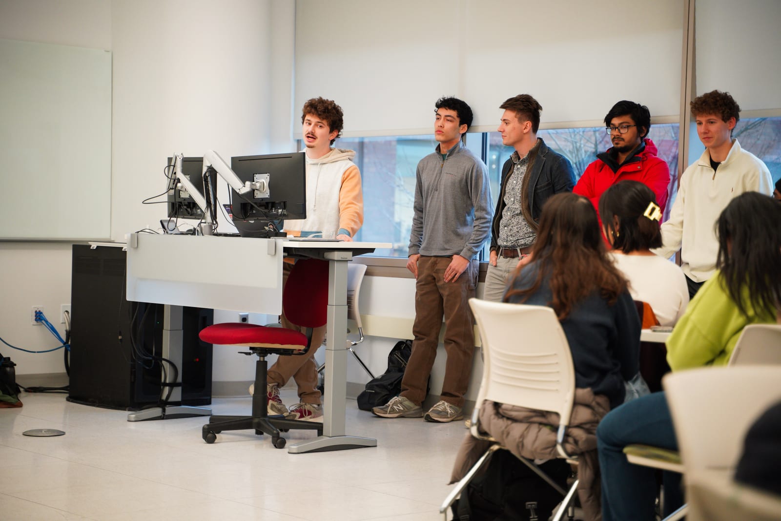 Seth Bernstein presenting his work to members of the Temple HCI Lab.