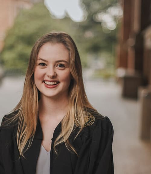 A headshot-style photograph of Ashley Boone