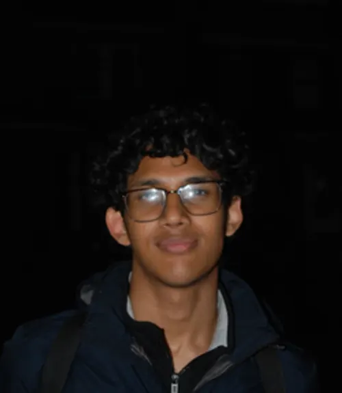 A headshot-style photograph of Ashfin Rahman