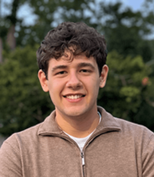 A headshot-style photograph of Arvin Mefsha