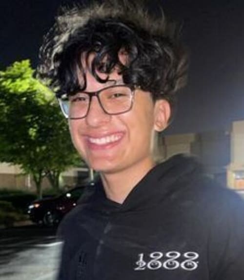 A headshot-style photograph of Brian Ramos