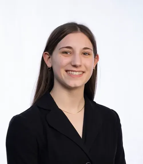 A headshot-style photograph of Christine Kapp