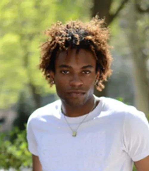 A headshot-style photograph of Chiku Okechukwu