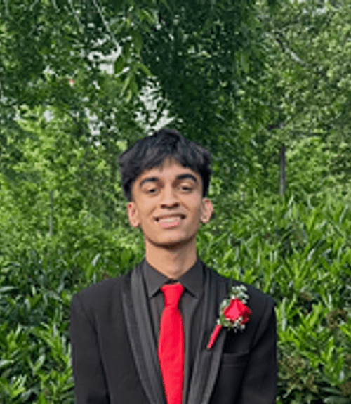 A headshot-style photograph of Dev Patel