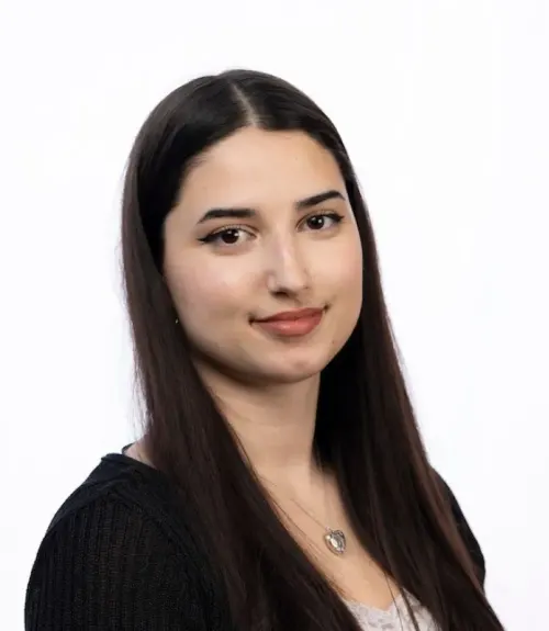 A headshot-style photograph of Egi Rama