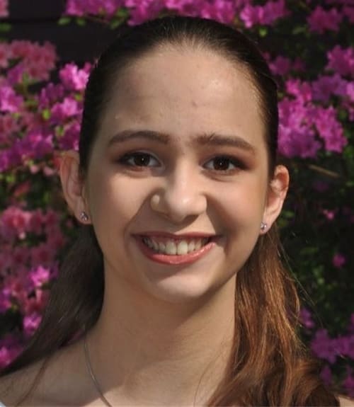 A headshot-style photograph of Erin Ross