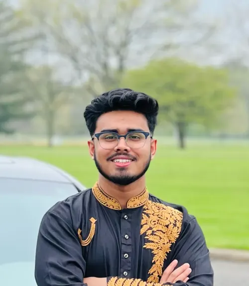 A headshot-style photograph of Fuad Hassan