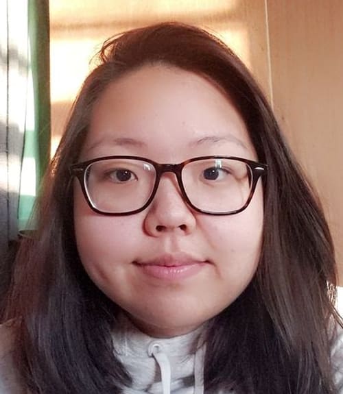 A headshot-style photograph of Joanne Kim