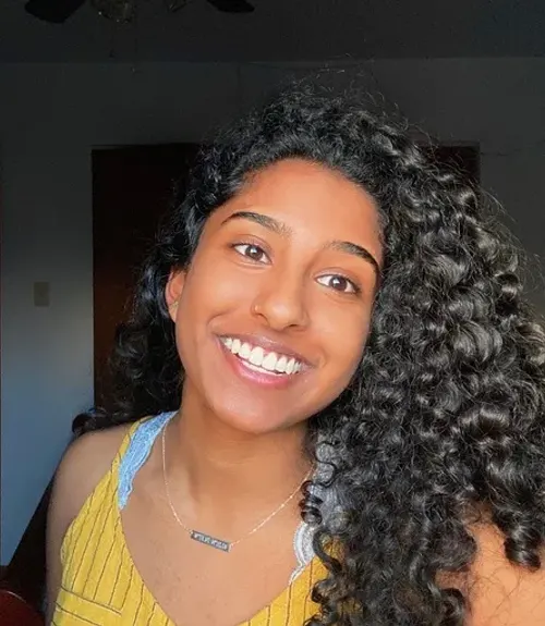 A headshot-style photograph of Jaina Lukose