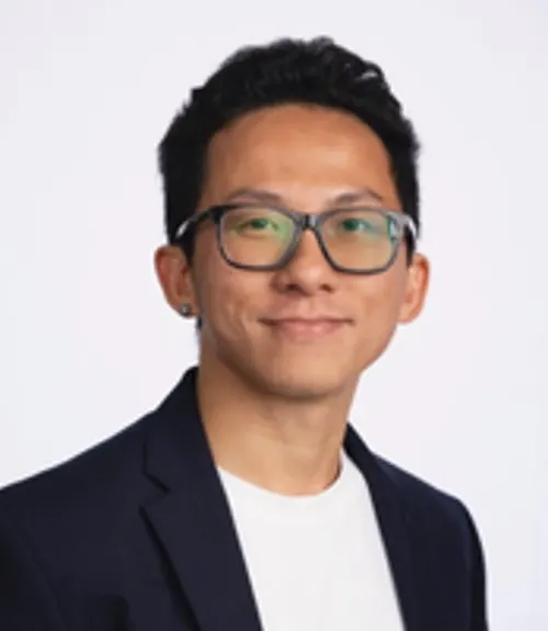 A headshot-style photograph of Jamie Nguyen