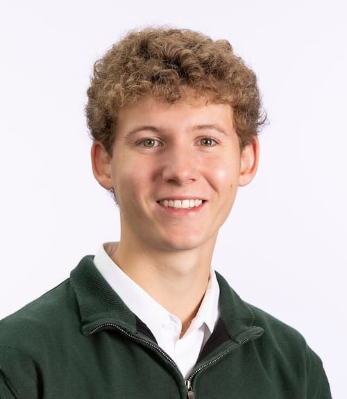 A headshot-style photograph of Kenneth Angelikas