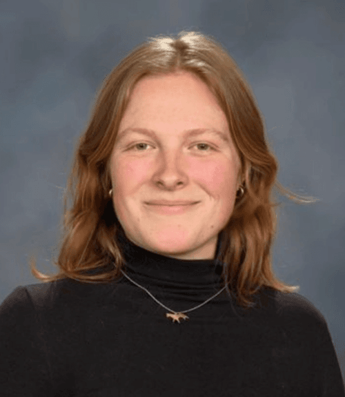 A headshot-style photograph of Kate Hamilton