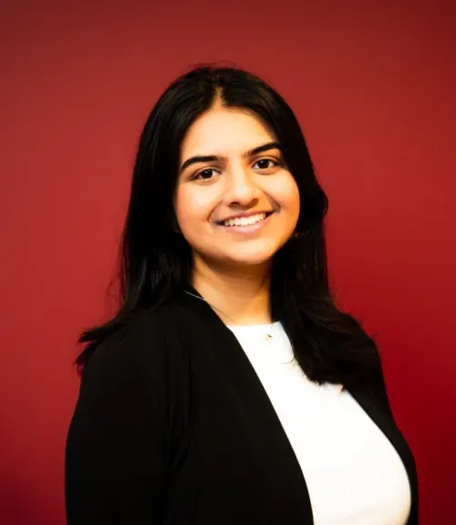 A headshot-style photograph of Kriti Baru