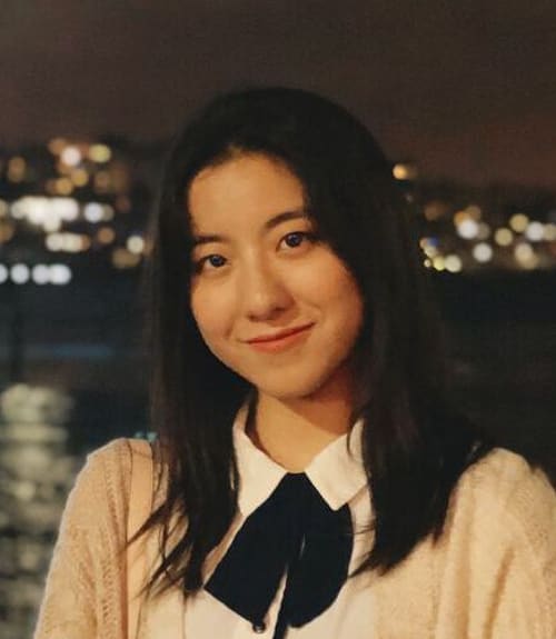 A headshot-style photograph of Kexin Quan