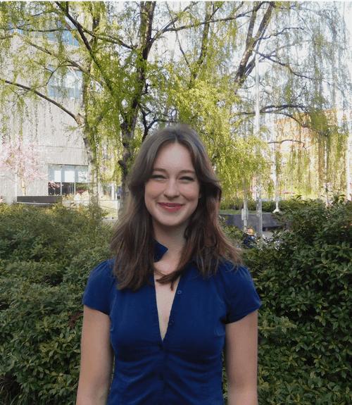 A headshot-style photograph of Louise Dupont