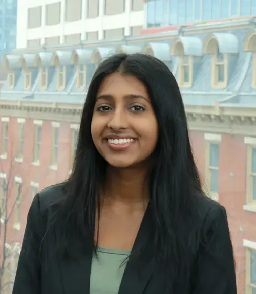 A headshot-style photograph of Megha Joshi