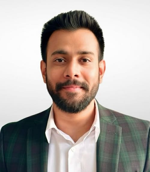 A headshot-style photograph of Mukunth Rajendran