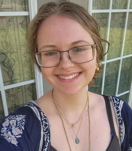 A headshot-style photograph of Rebecca Fritz