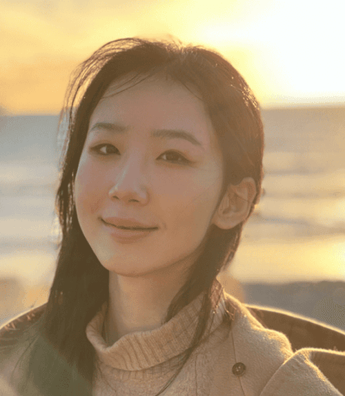 A headshot-style photograph of Susie Jin