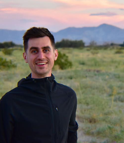 A headshot-style photograph of Stephen MacNeil