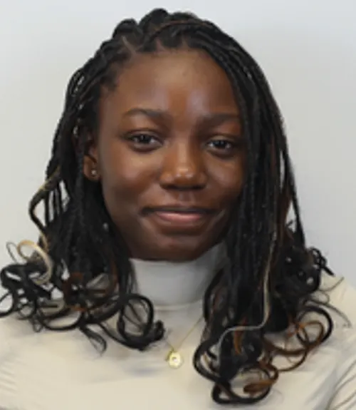 A headshot-style photograph of Sheena Nnam