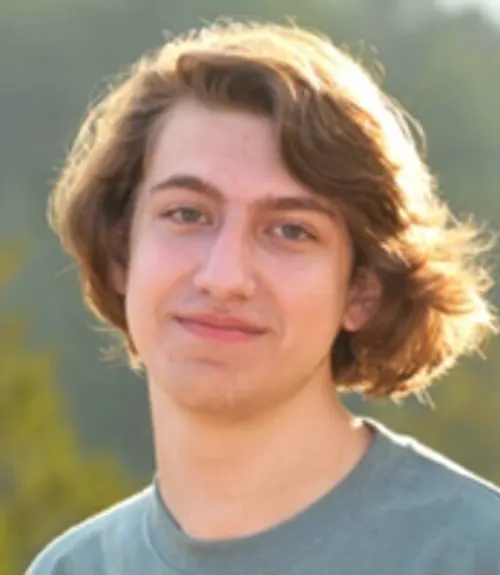 A headshot-style photograph of TJ McBride