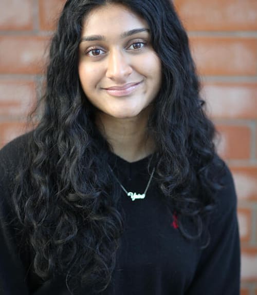 A headshot-style photograph of Yatri Patel