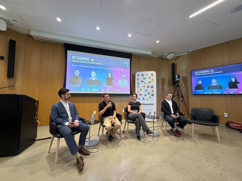 Speaking during a design lab panel discussion.