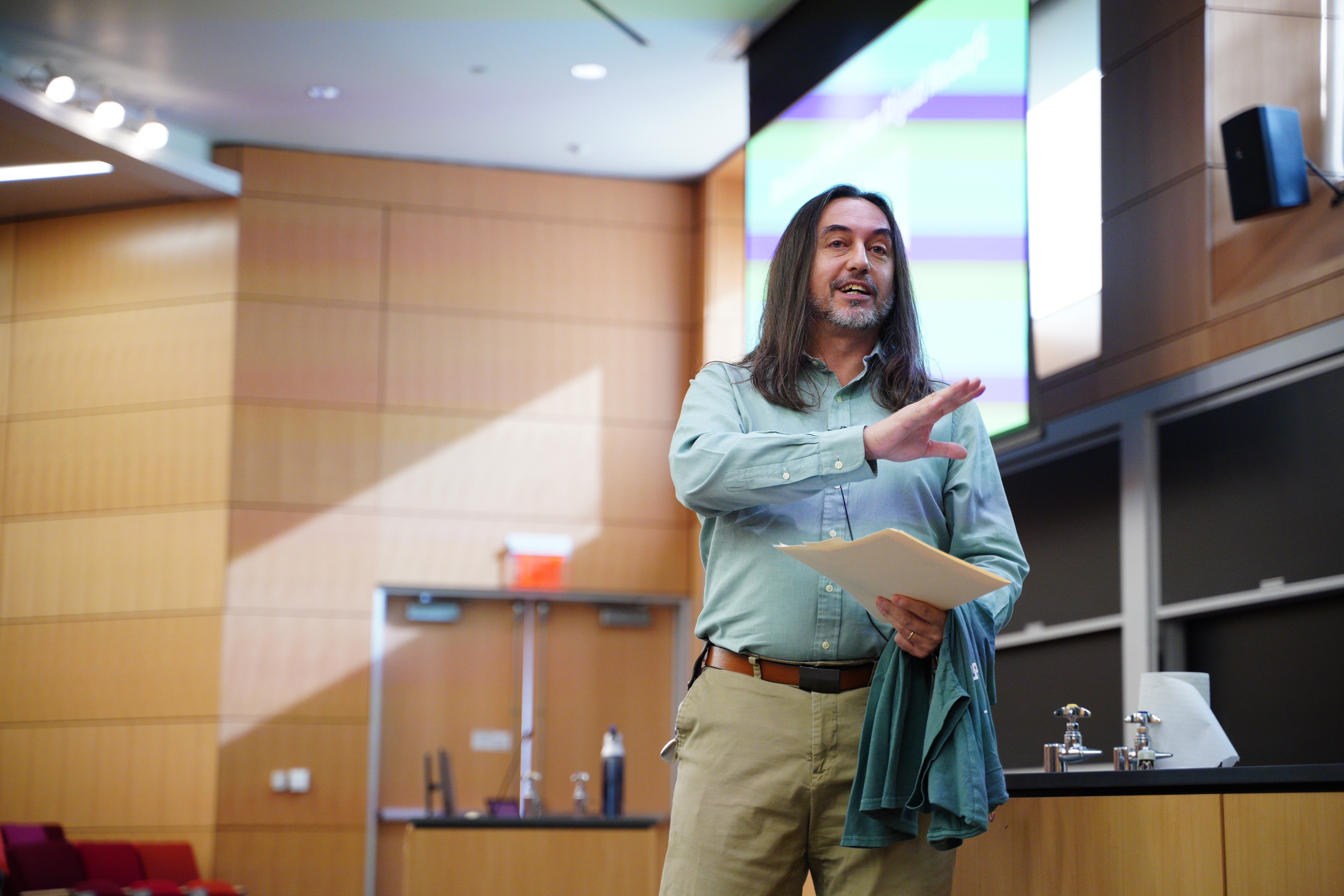 Dean Miguel Mostafa speaking at OwlHacks 2024