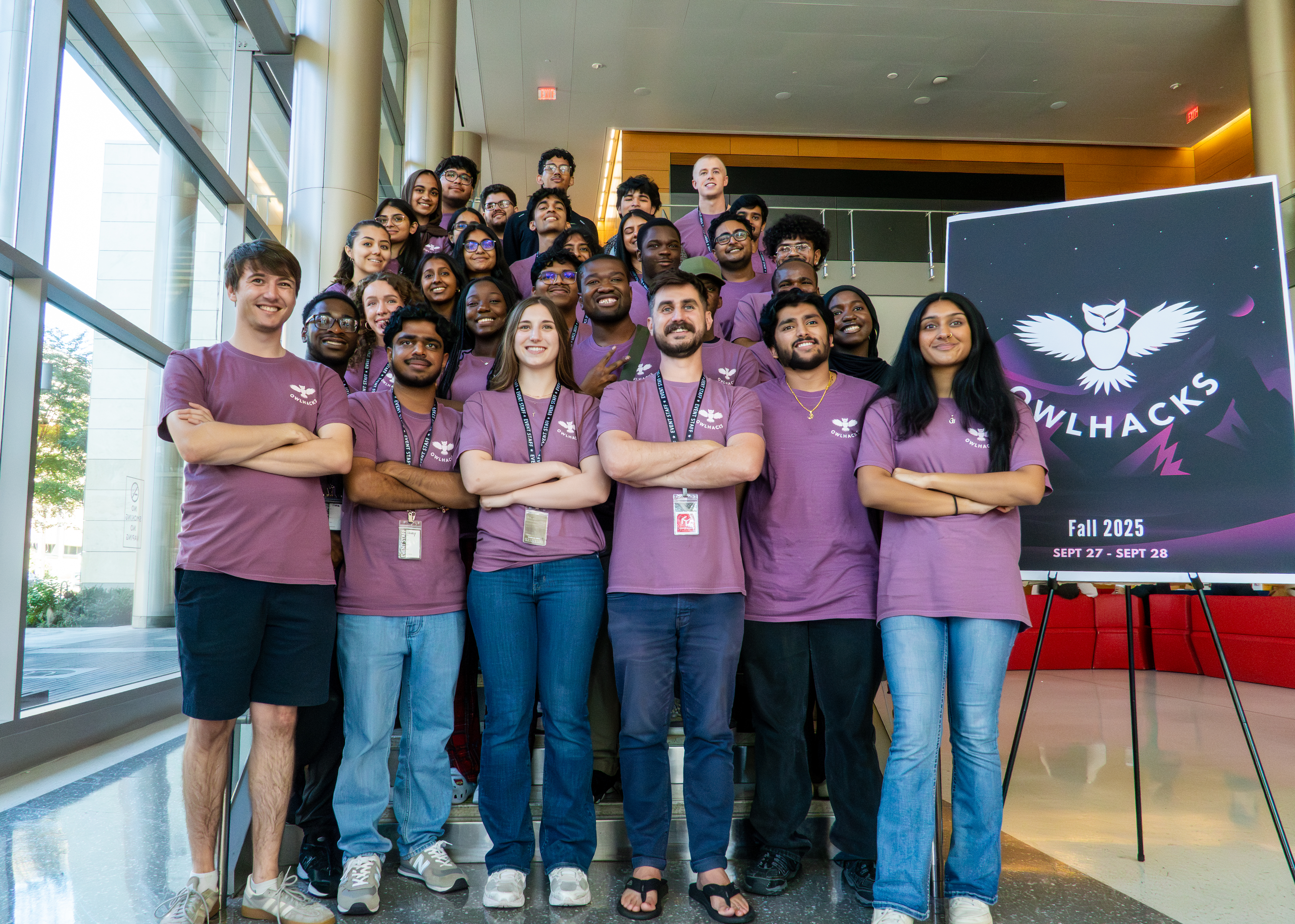 Professor Stephen MacNeil standing with the 2025 OwlHacks organizing committee