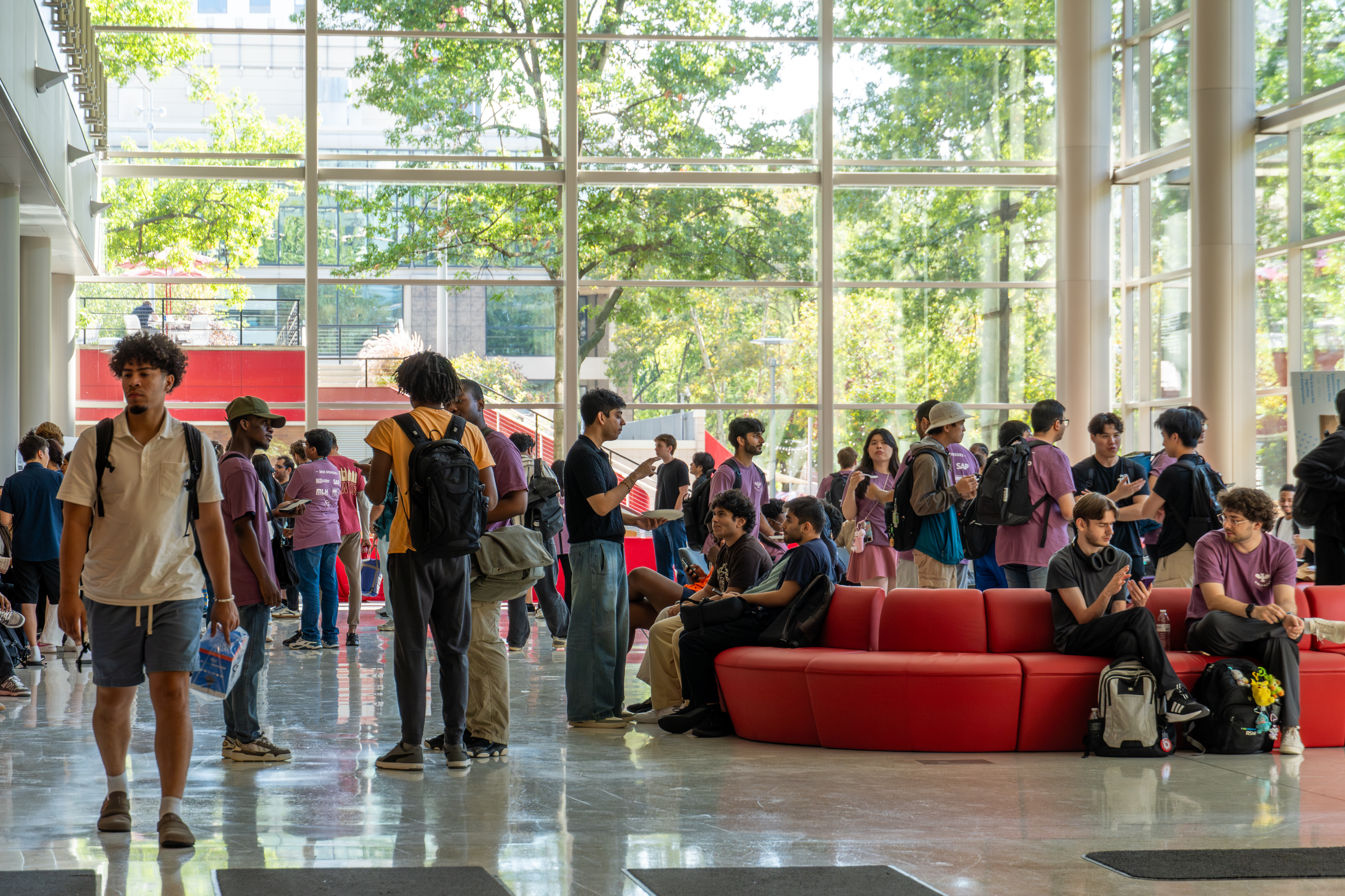 Participants gathering in the Atrium for coffee and snacks at OwlHacks 2025
