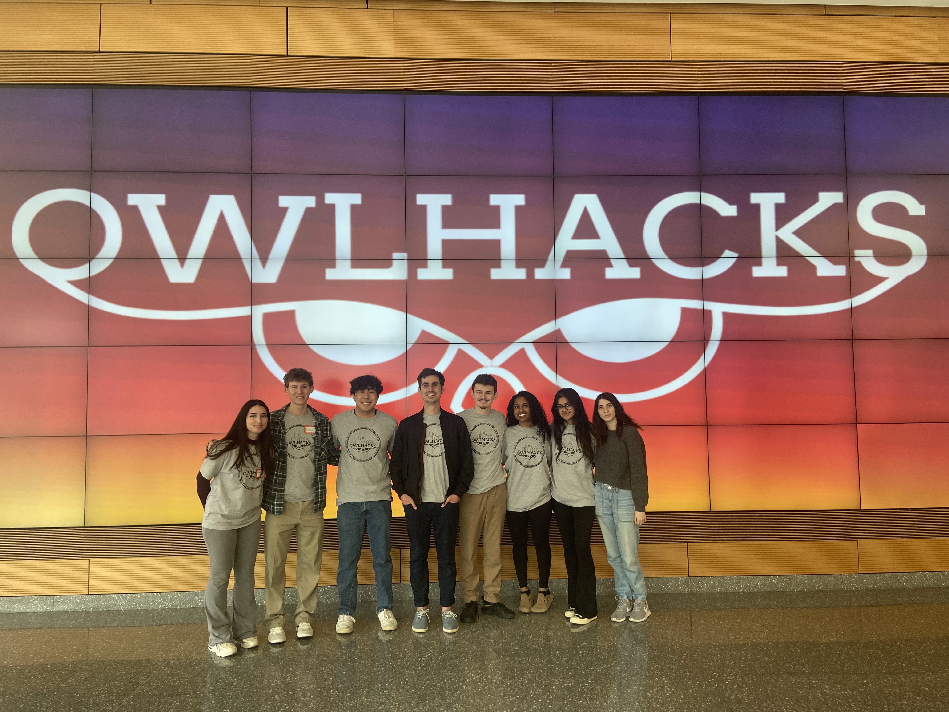 Stephen MacNeil standing with OwlHacks organizers at the first event after the pandemic